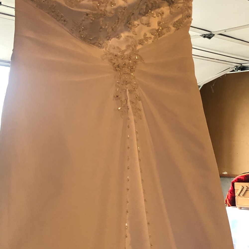 Beautiful wedding dresses I have three